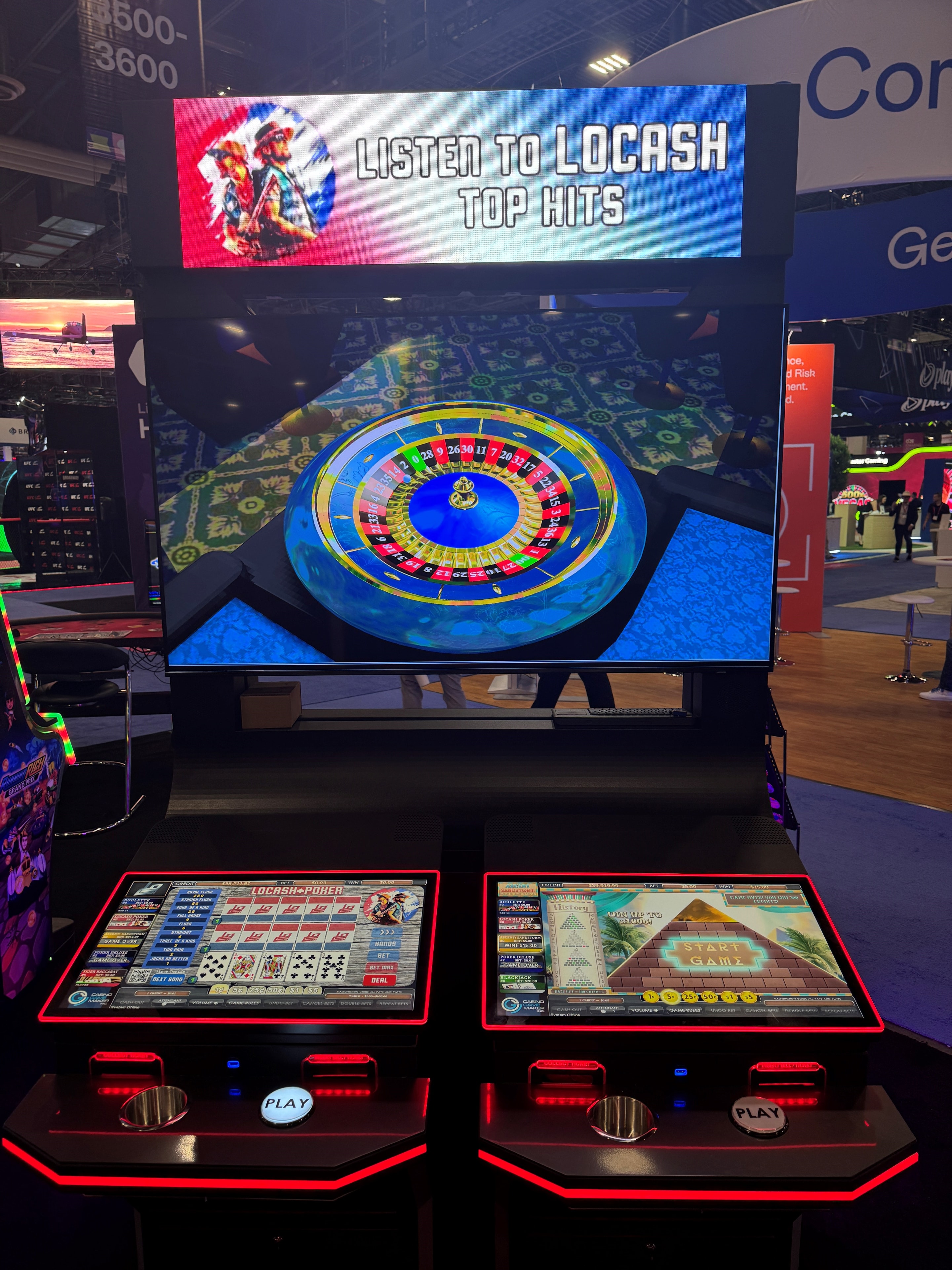 Casino Gamemaker slot topper LED display showing LoCash Top Hits promotional content